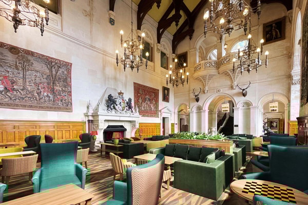 Historic charm meets everyday comfort in the Great Hall, where you can relax, play, and often catch a bit of daytime entertainment.