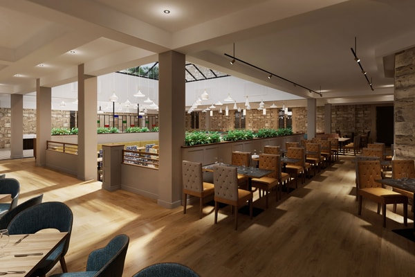 The Sherwood Restaurant, featuring the Market Kitchen, invites you to dine beneath a glass roof that floods the room with natural light, while the original outer walls reflect the building’s historic roots.