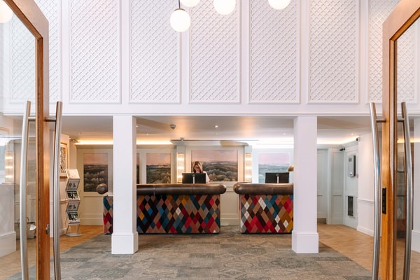 Step into a warm welcome - our reception greets you with light, space, and a smile.