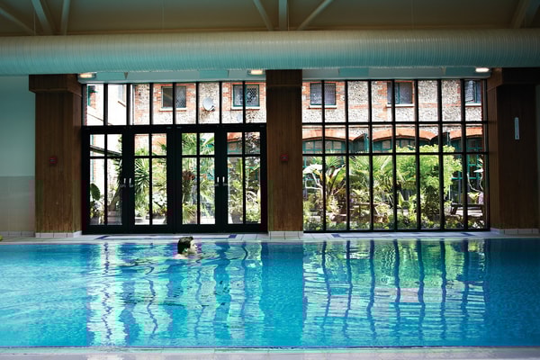 Dive into relaxation at Littlecote House. Enjoy refreshing moments in our serene indoor pool, the perfect escape for leisure and tranquillity.