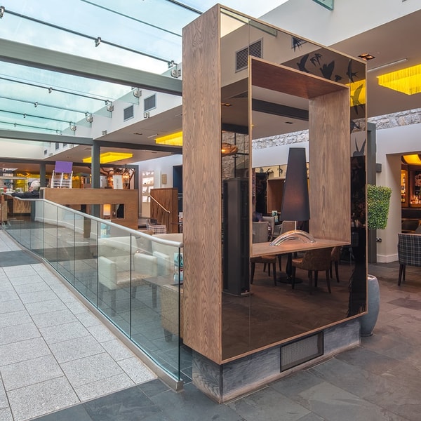 Enter the atrium and be greeted by our reception, with a bar nearby where you can relax and settle in after your travels.