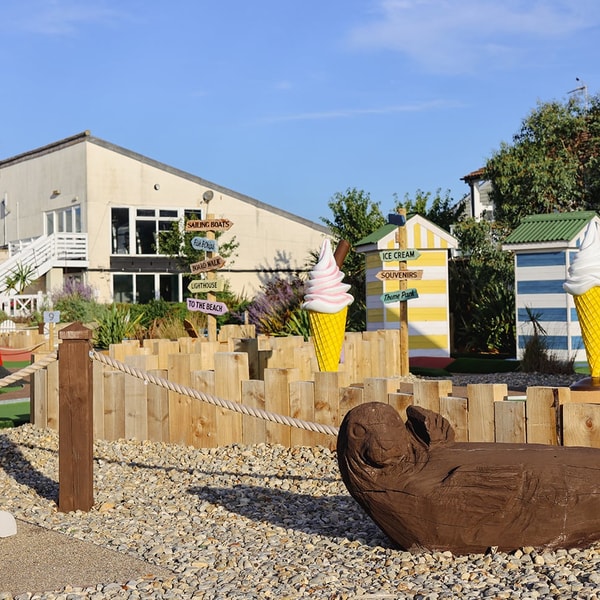 Seaside fun awaits! From giant ice creams to a mini lighthouse and wooden seal, there’s plenty to spot on the grounds at Corton.