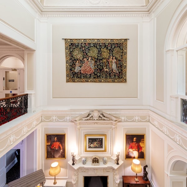 Imagine stepping into this grand reception, filled with beautiful artwork and historic character - you just know you’re in for a wonderful stay.