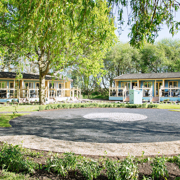 Surrounded by trees and the tranquility of nature, our Woodland Lodges offer a peaceful retreat that’s loved by our guests.