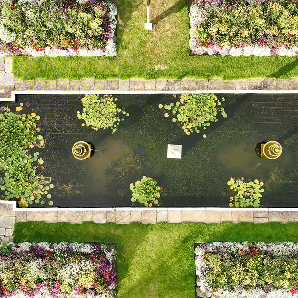 From this aerial view, the Walled Garden reveals its charm. A tranquil retreat for quiet moments and gentle strolls.