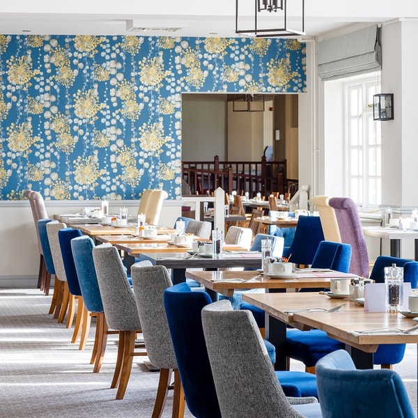 At the Four Tides Restaurant, sunlight pours through wide windows, infusing the space with a bright, cheerful coastal vibe - the ideal backdrop for a leisurely breakfast or a relaxed dinner.