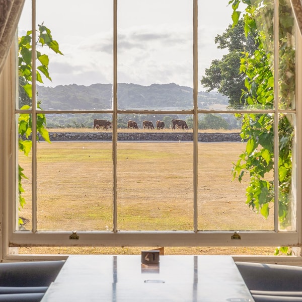 The Blue room is another elegant space where guests can enjoy stunning views of the Herefordshire countryside - complete with grazing cows.