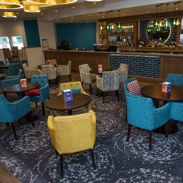 Head to the bar, where every corner invites you to sit back, relax, and soak up the atmosphere. With cosy chairs and stylish tables, it’s the perfect space for good times and great company.