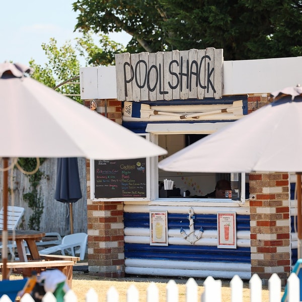 Grab a drink from the Pool Shack, chill under the umbrellas, and soak up those rays. With beautiful sea views surrounding you too, your perfect summer day awaits.