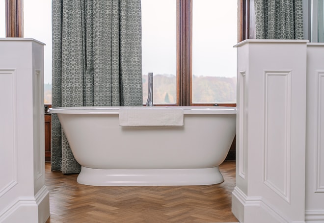 Bath on a raised platform inside a Manor House Suite at Thoresby Hall