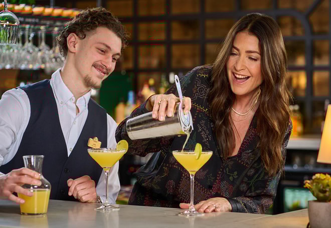 Lisa Snowden, Chief Joy Officer at Warner Hotels, finishes crafting her own cocktail during a cocktail masterclass at The Runnymede on Thames