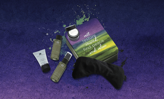 A relaxation gift set featuring Templespa products: cooling balm, resting cream, and calming sprays, all in a colorful tin.