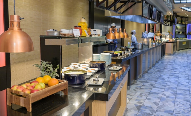 Modern hotel buffet restaurant with fresh food stations