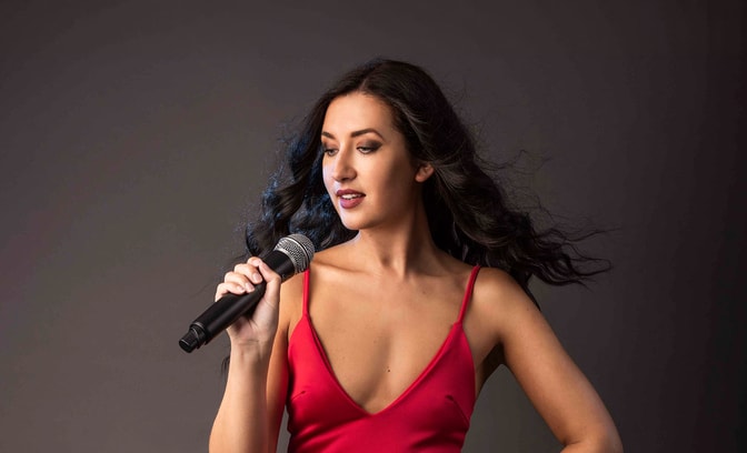 chess taylor in a red dress