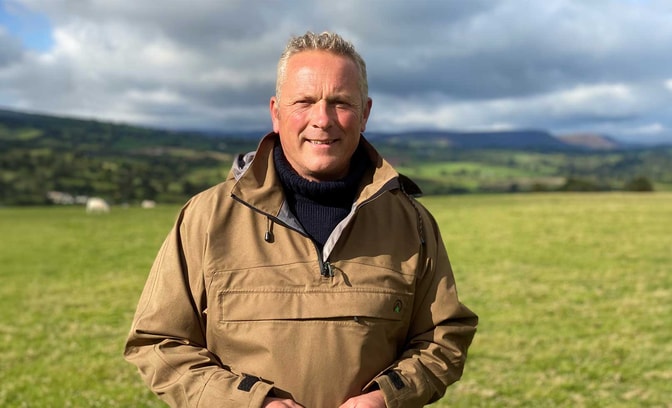 jules hudson standing in countryside