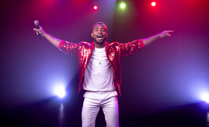 Junior B performing on stage
