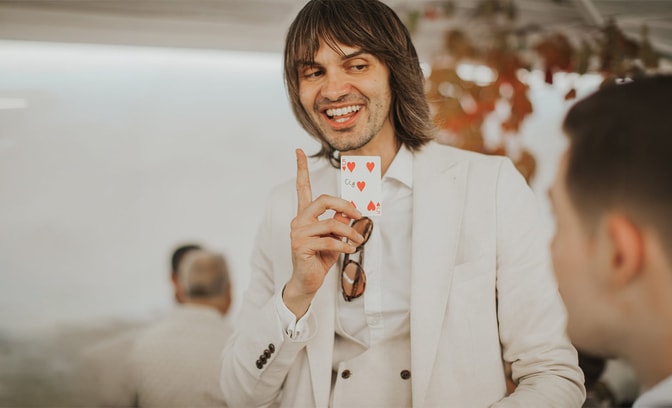 pete heat in a white suit