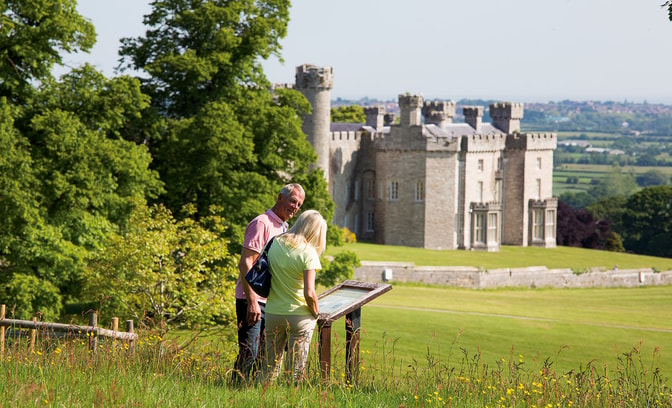 Two guests exploring the grounds at Bodelwyddan Castle
