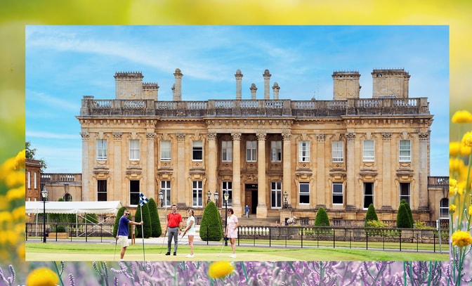 Guests playing golf in front of Heythrop Park Hotel
