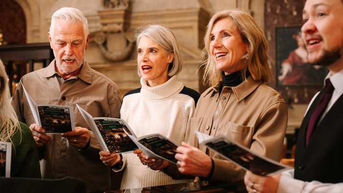 A group of carol singers at a Warner Hotel