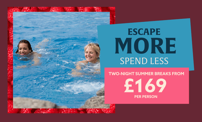 Two people swimming in a bright blue pool, with promotional text about summer breaks framed by a raspberry border.