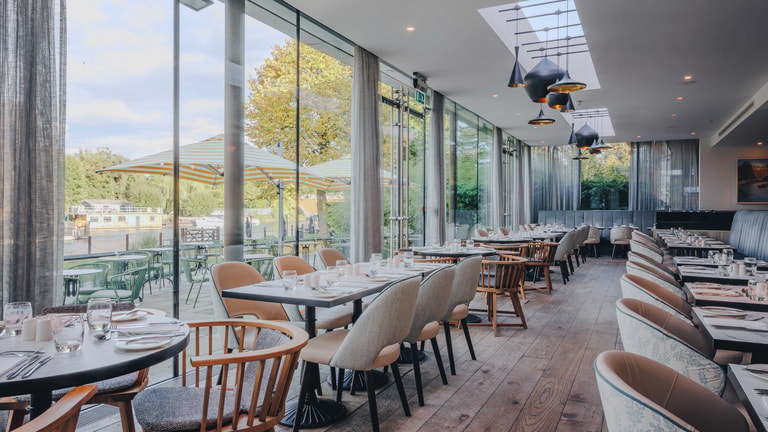 Tables and chairs set up in the Market Kitchen