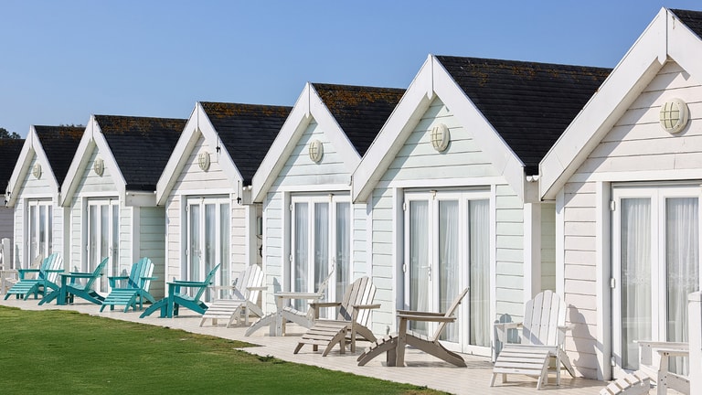 Sit back and enjoy the view of the sea from your very own patio in a Clifftop Lodge