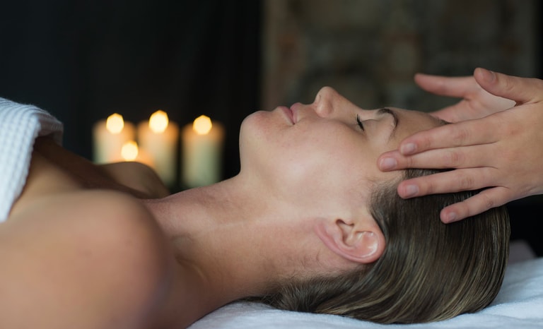 Close up of a guest receiving a facial treatment