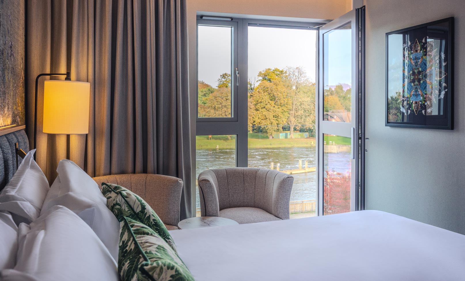 Bedroom with river view at The Runnymede on Thames