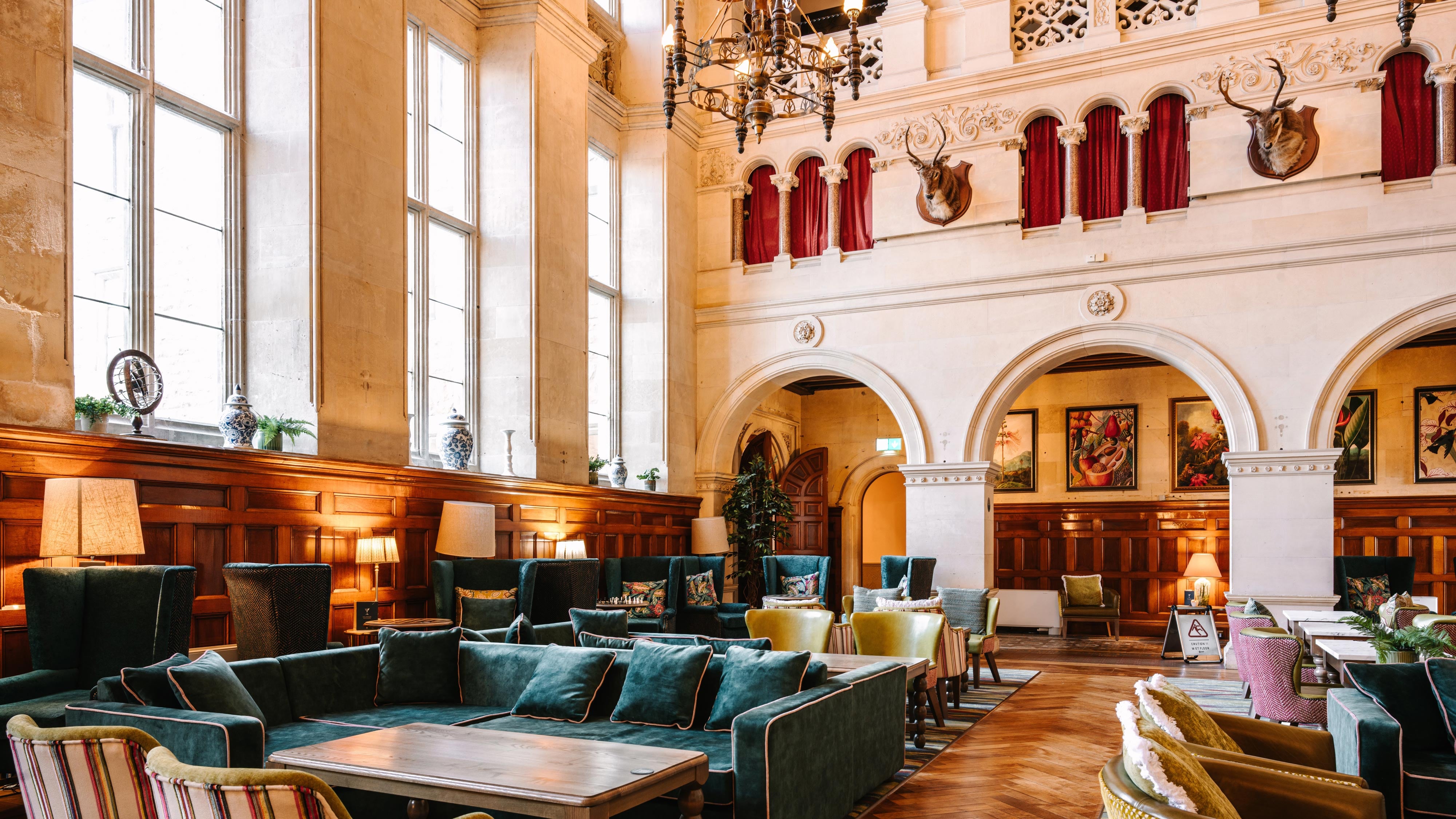 Historic charm meets everyday comfort in the Great Hall, where you can relax, play, and often catch a bit of daytime entertainment.