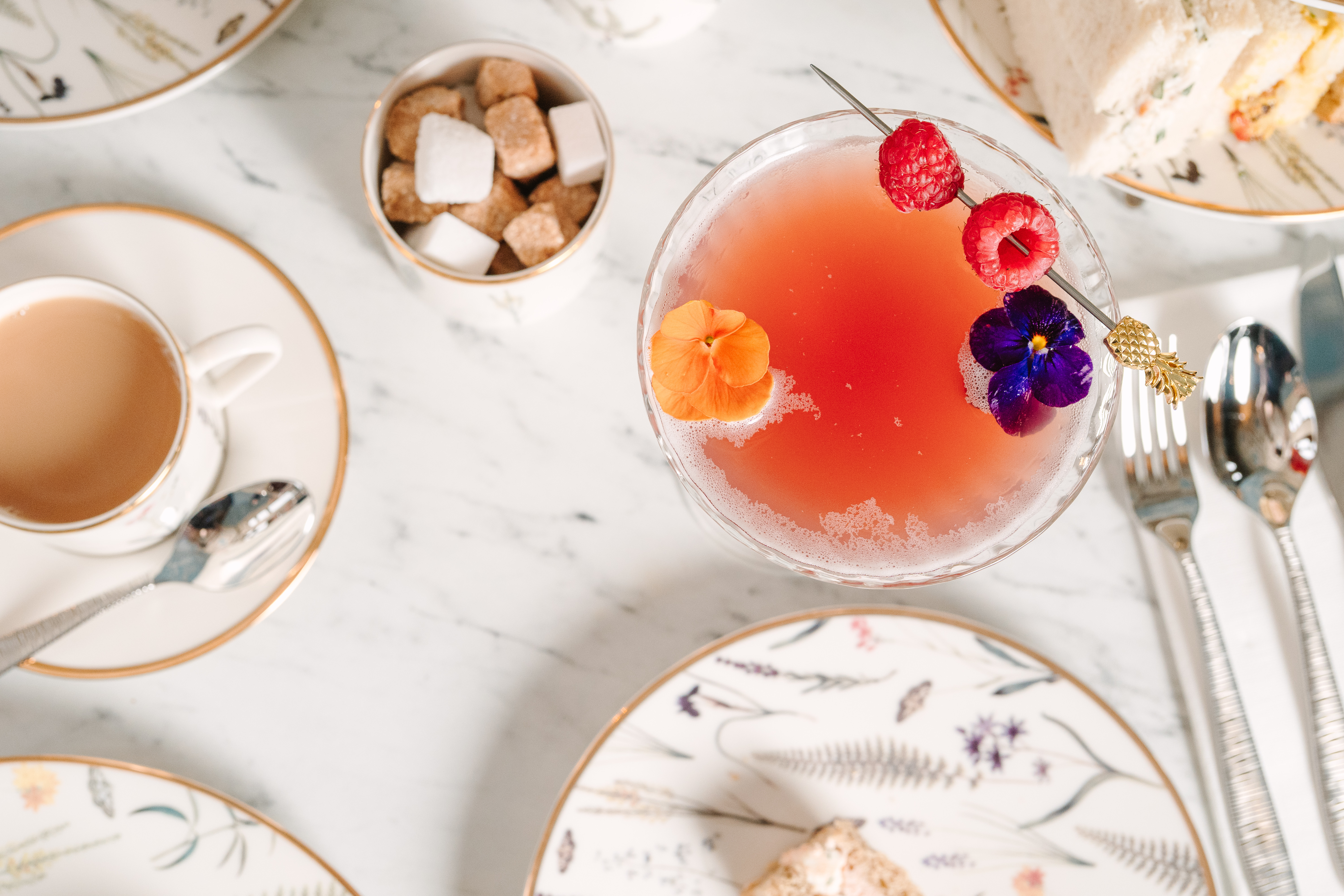 A cocktail and a cup of tea from above
