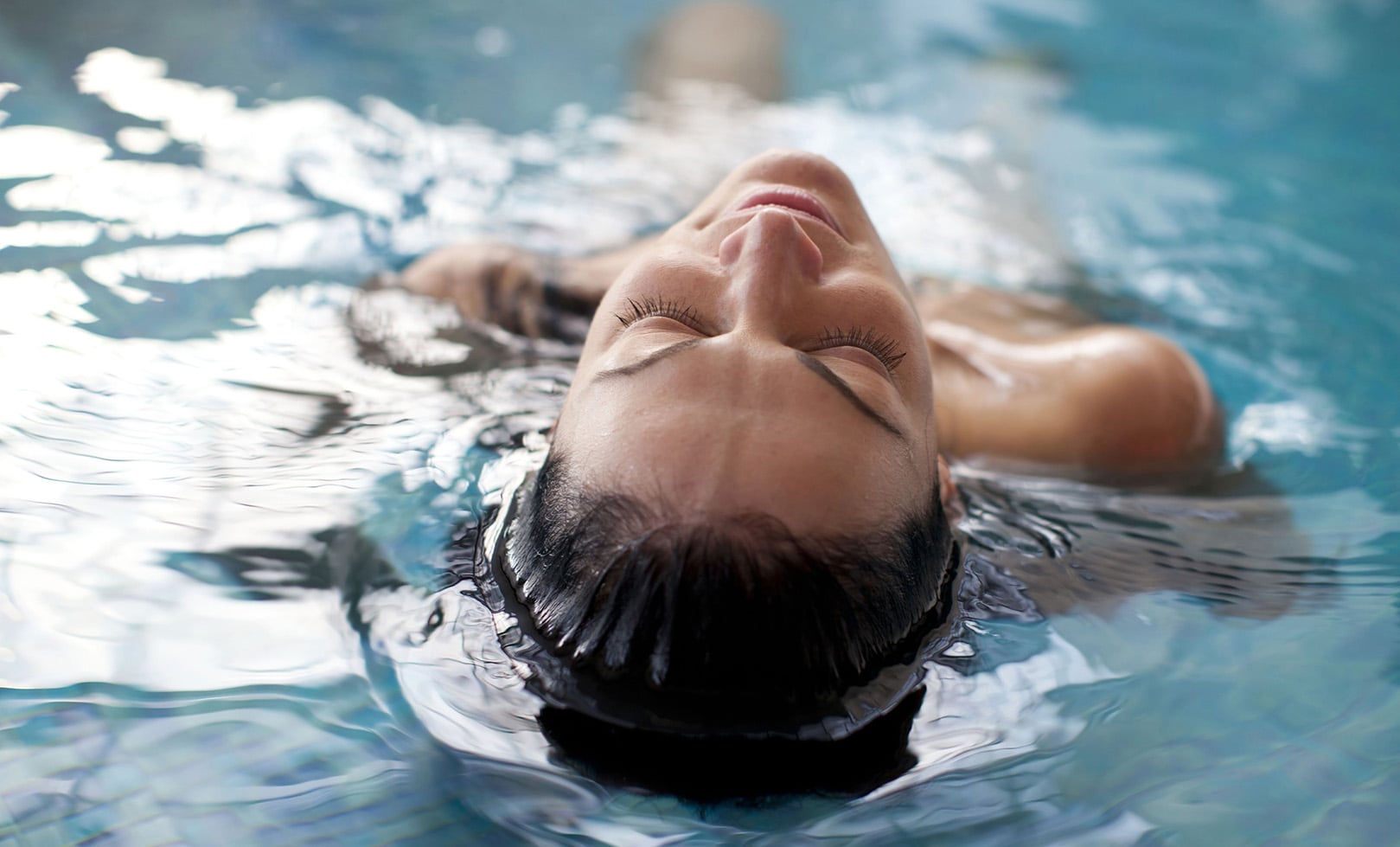 Woman swimming in pool