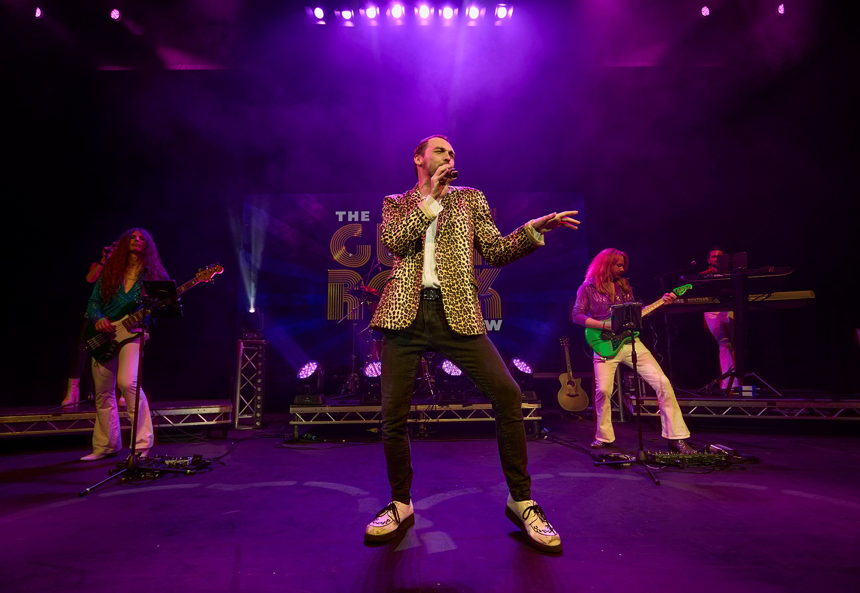 The Glam Rock Show performing on stage