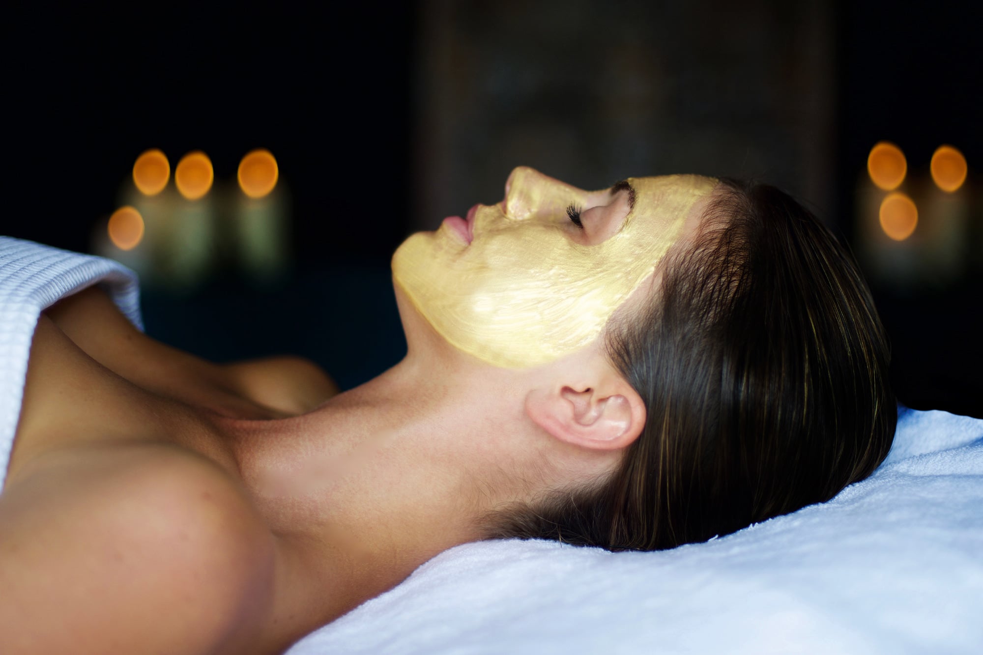 Woman's face from side on with a face mask on