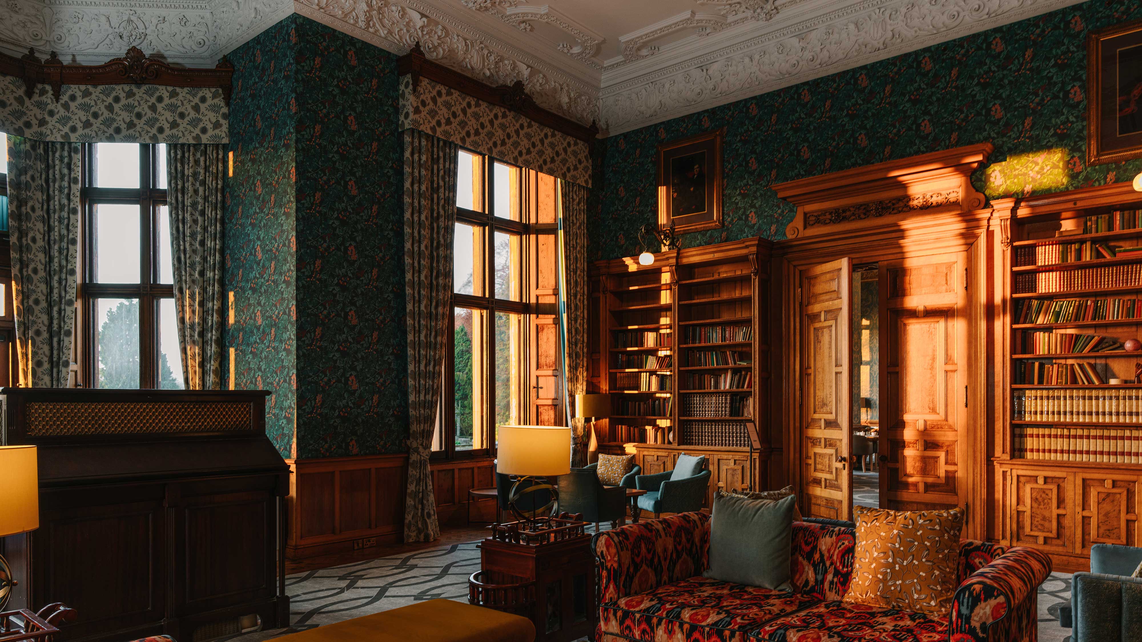 A view of a historic library inside the manor house at Thoresby Hall